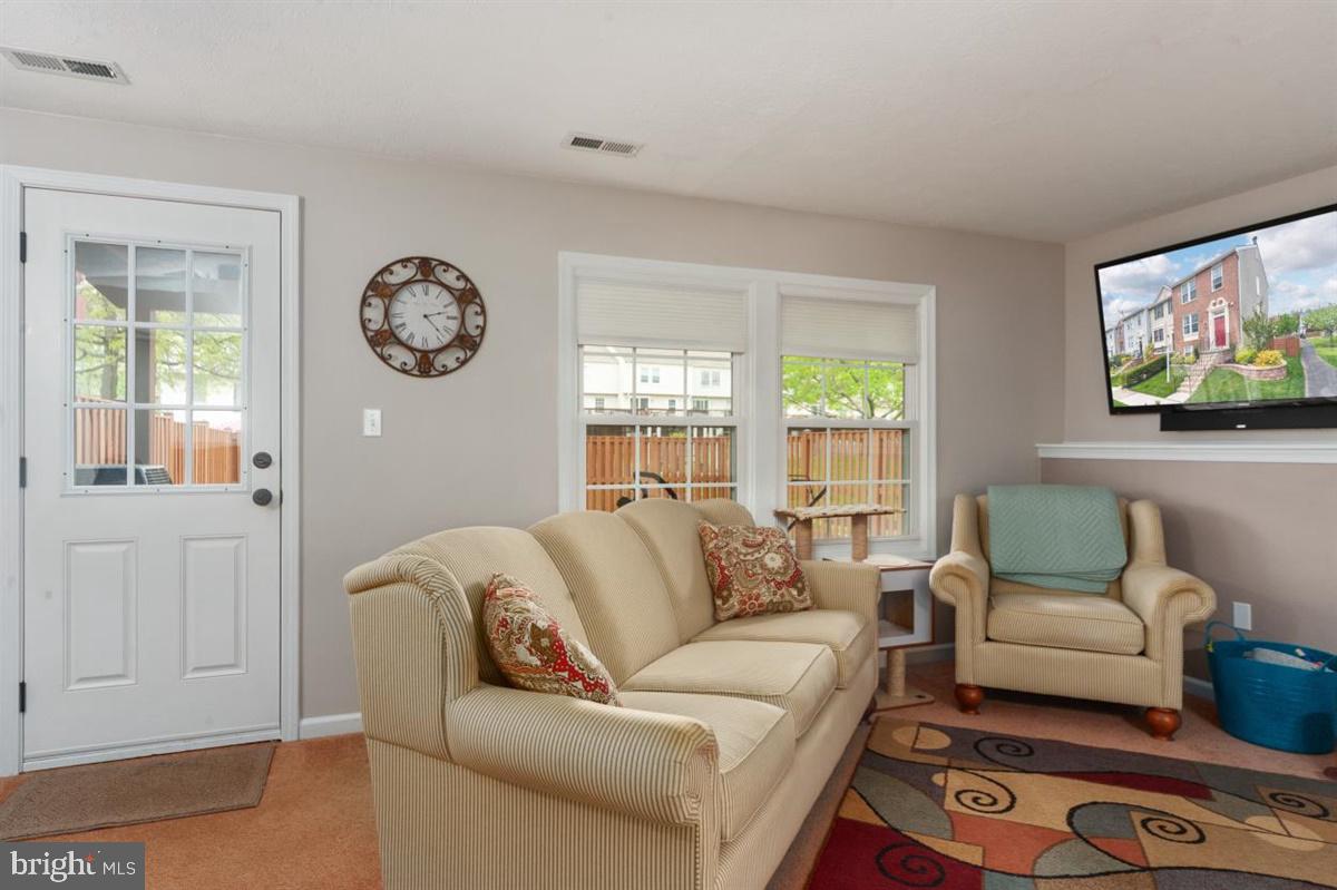 2479 Warm Spring Way Odenton, MD 21113 - Photo 23 of 34 Lower-level family room with walk-out access