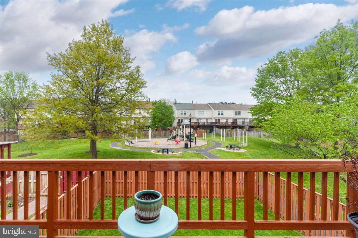 2479 Warm Spring Way Odenton, MD 21113 - Photo 28 of 34 Freshly stained deck with view of tot lot