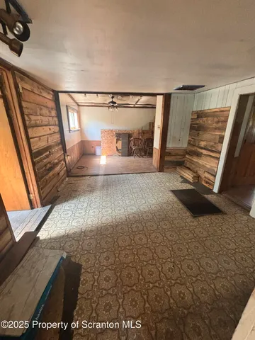 a view of a livingroom with furniture