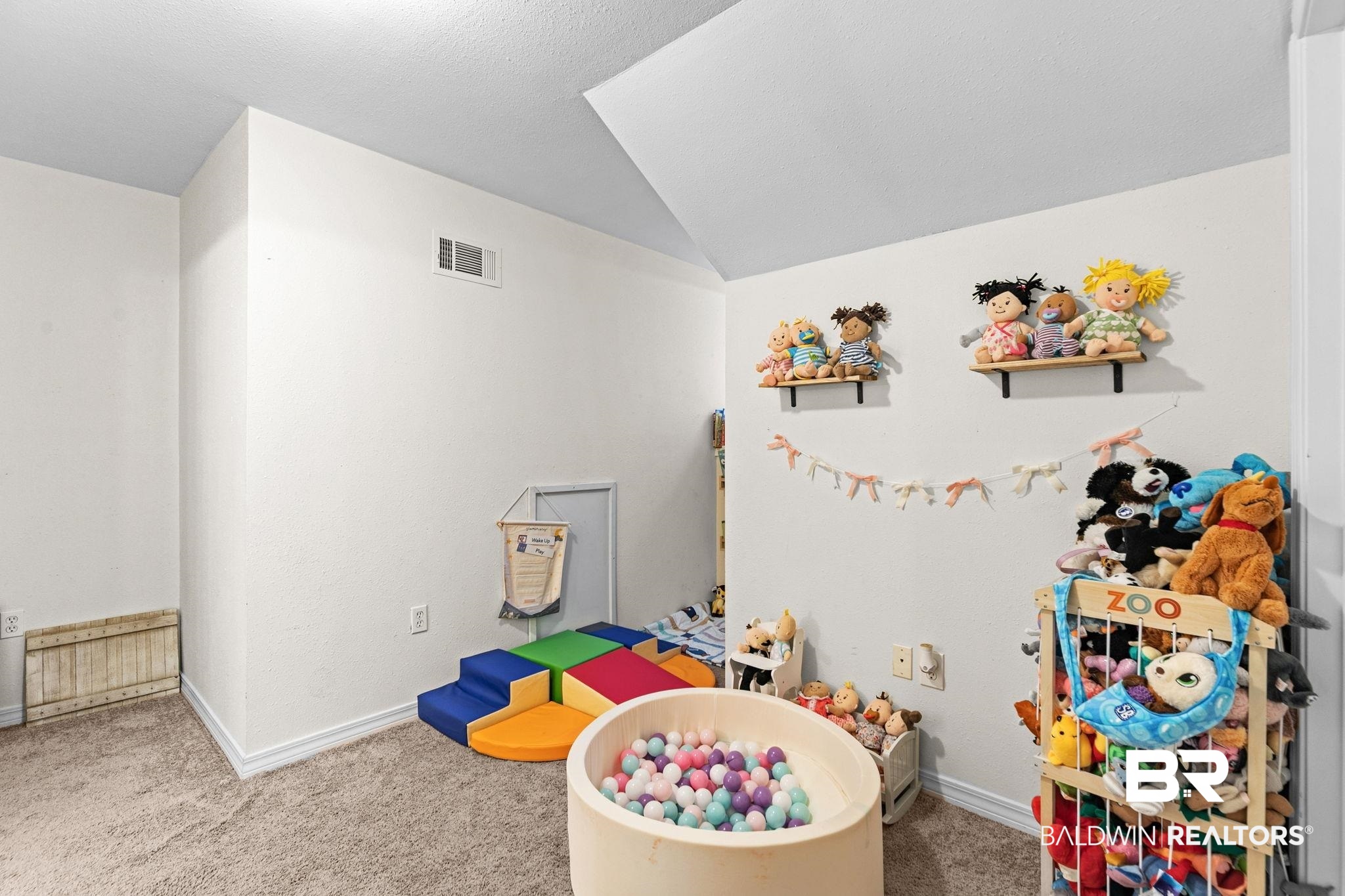 3842 Experiment Farm Road Monroeville, AL 36460 - Photo 50 of 59 Game room featuring carpet and lofted ceiling