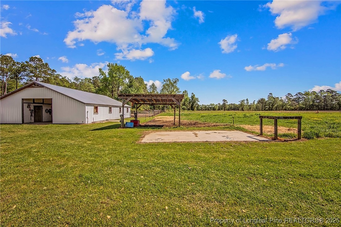 40 Kinlaw Road Lumberton, NC 28358 - Photo 13 of 50 a view of a house with a yard