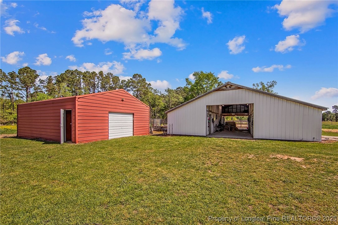 40 Kinlaw Road Lumberton, NC 28358 - Photo 15 of 50 a view of a house with a yard
