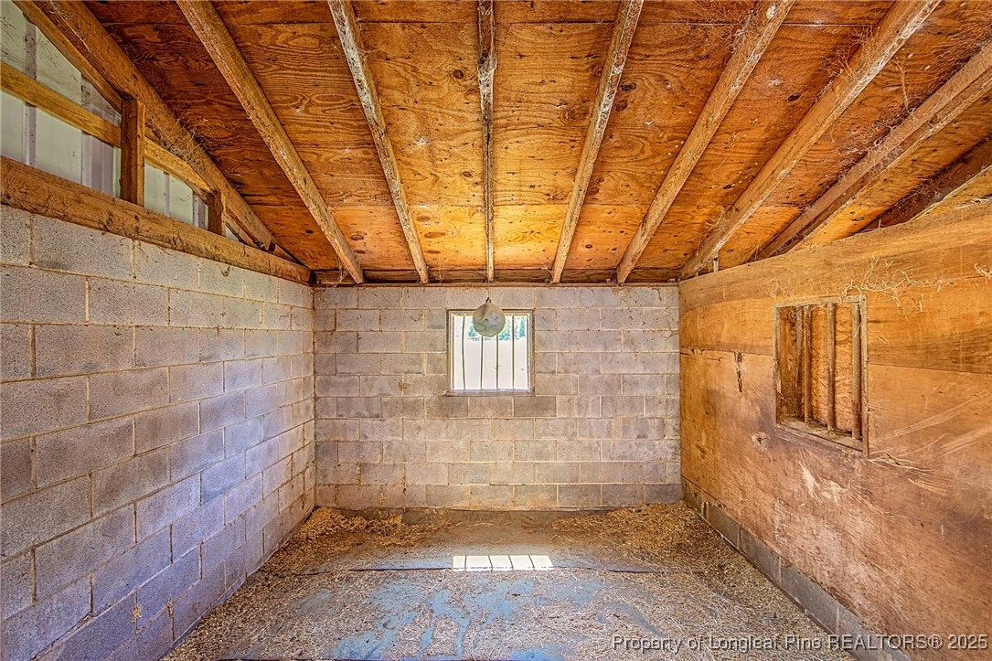 40 Kinlaw Road Lumberton, NC 28358 - Photo 26 of 50 a view of a hallway with a wooden fence