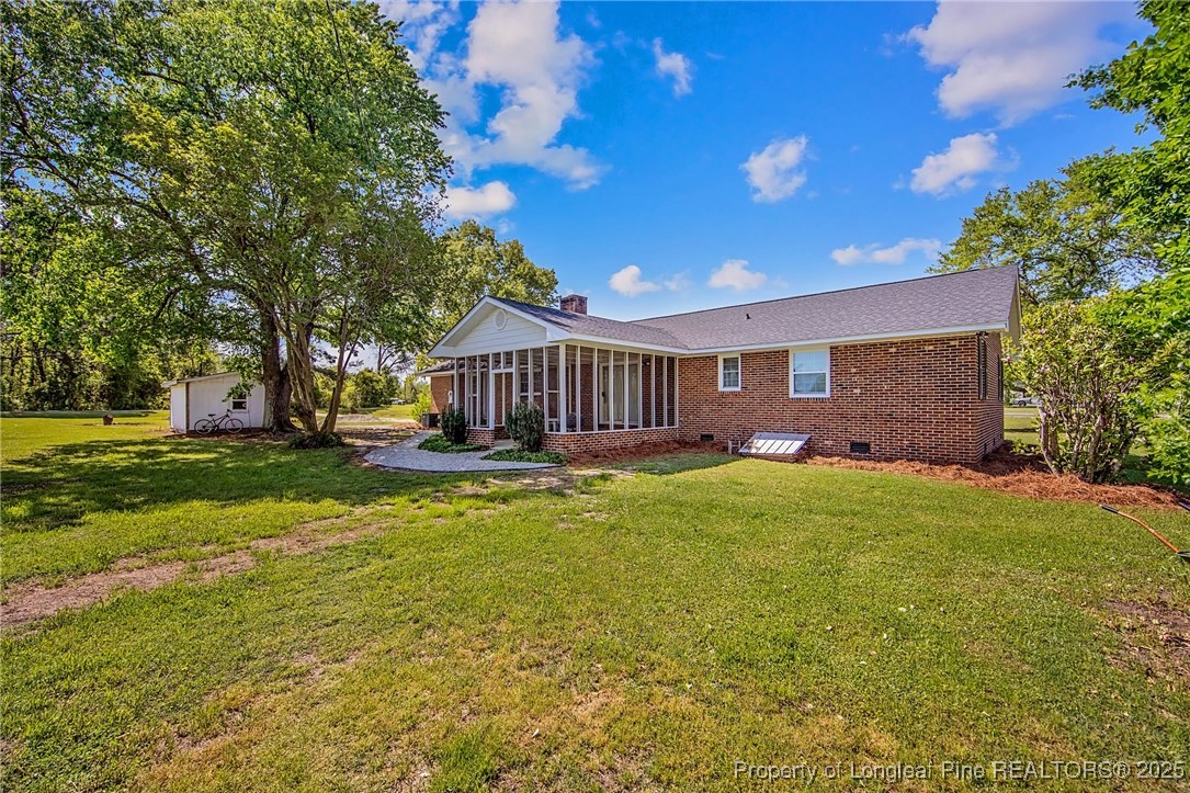 40 Kinlaw Road Lumberton, NC 28358 - Photo 3 of 50 a view of a house with a yard