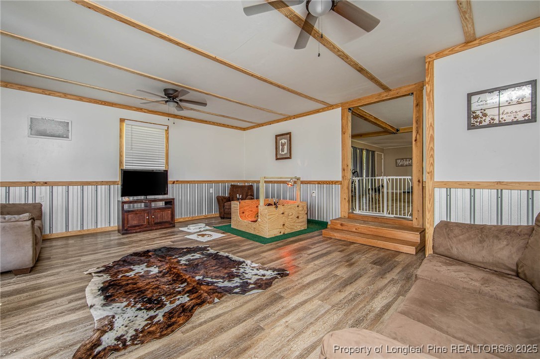 40 Kinlaw Road Lumberton, NC 28358 - Photo 31 of 50 a bedroom with furniture large window and wooden floor