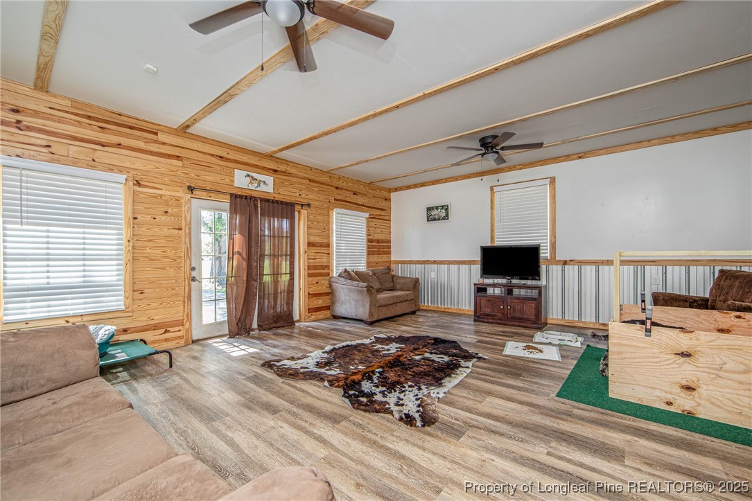 40 Kinlaw Road Lumberton, NC 28358 - Photo 32 of 50 a living room with furniture and a flat screen tv