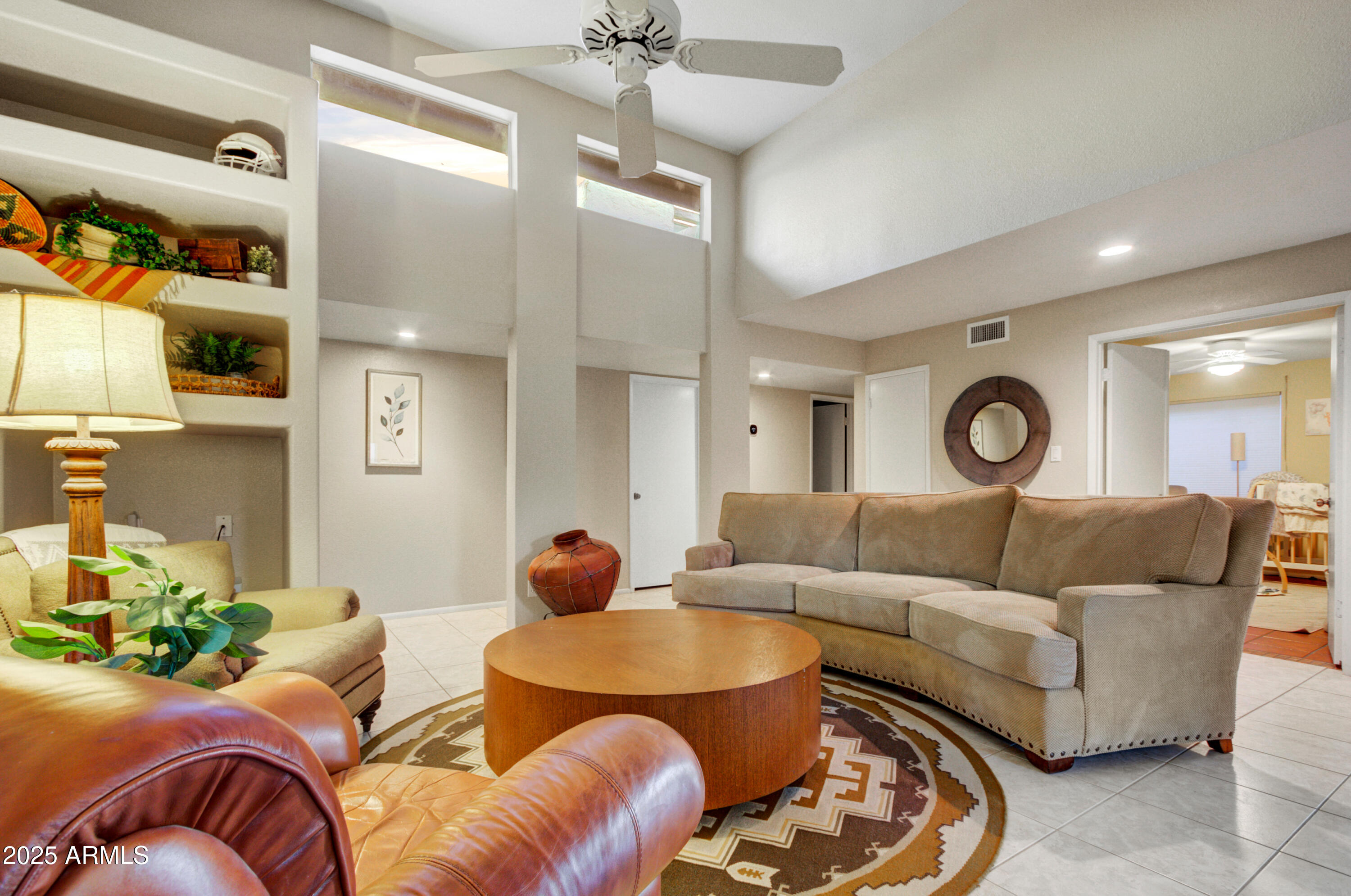 25828 North Primo Circle Rio Verde, AZ 85263 - Photo 2 of 21 a living room with furniture and a large window