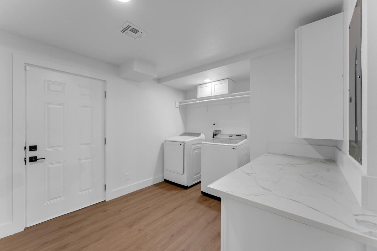 407 East Kerr Street Burnet, TX 78611 - Photo 18 of 21 a view of utility room with washer and dryer
