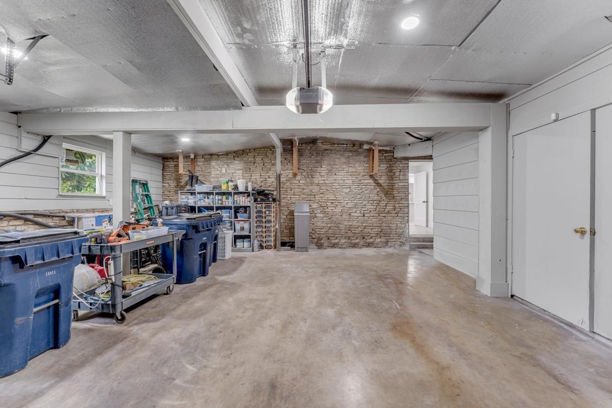 407 East Kerr Street Burnet, TX 78611 - Photo 19 of 21 a view of an empty room with a fireplace