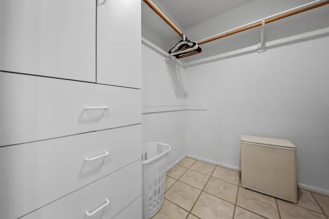 a view of a house with swimming pool and porch