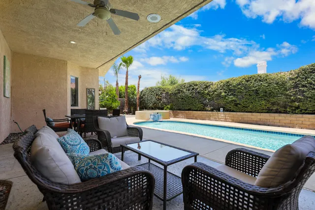 a view of a backyard of the house