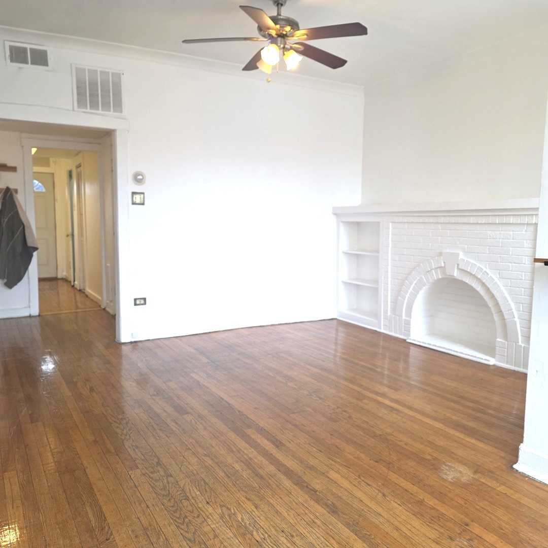 1248 North Spaulding Avenue, Unit 2 Chicago, IL 60651 - Photo 6 of 12 a view of empty room with wooden floor