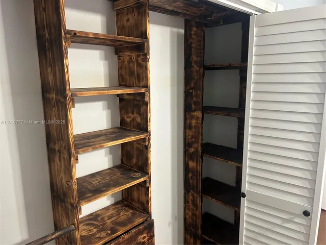 a view of storage and utility room