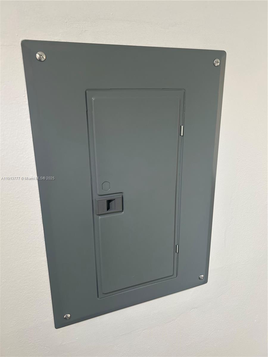 1051 Southwest 1st Street, Unit 404 Miami, FL 33130 - Photo 32 of 37 a view of cupboard