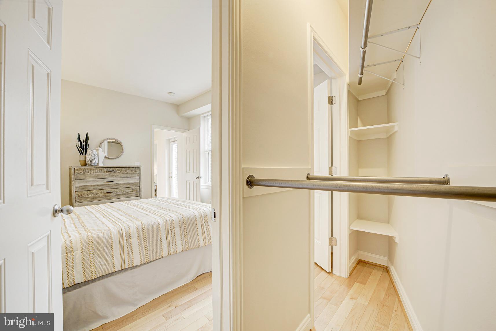 220 13th Street Southeast, Unit 24 Washington, DC 20003 - Photo 18 of 27 a bedroom with a bed and a window