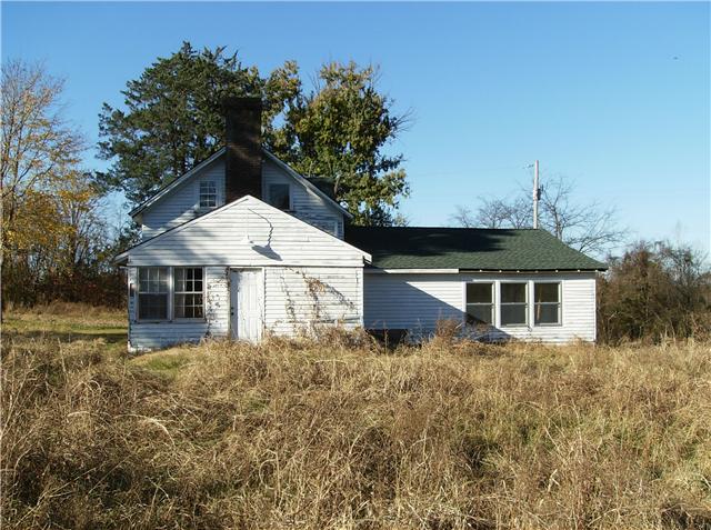 Side of Home...This side has the Master and the added -on room you see in photo is a large dressing or sitting room and closet just off the master...has a separate entrance door.