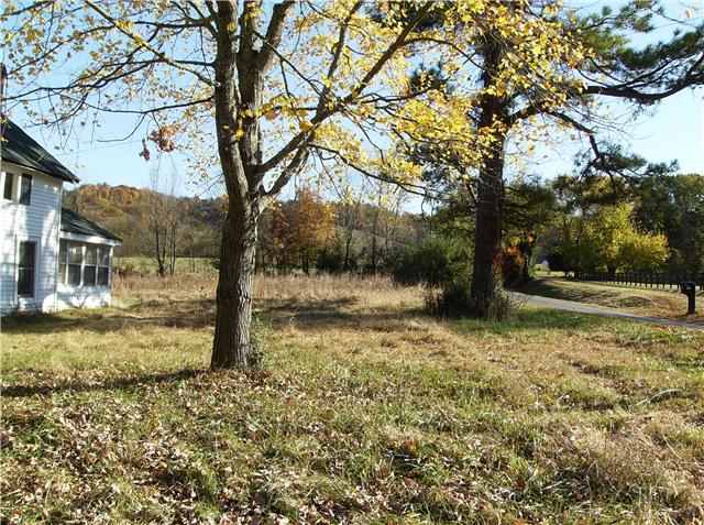 This view shows some of the road frontage.  Mature trees, some over a 100 years old.