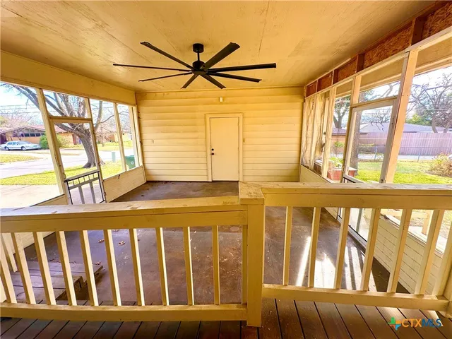 a view of a porch with furniture