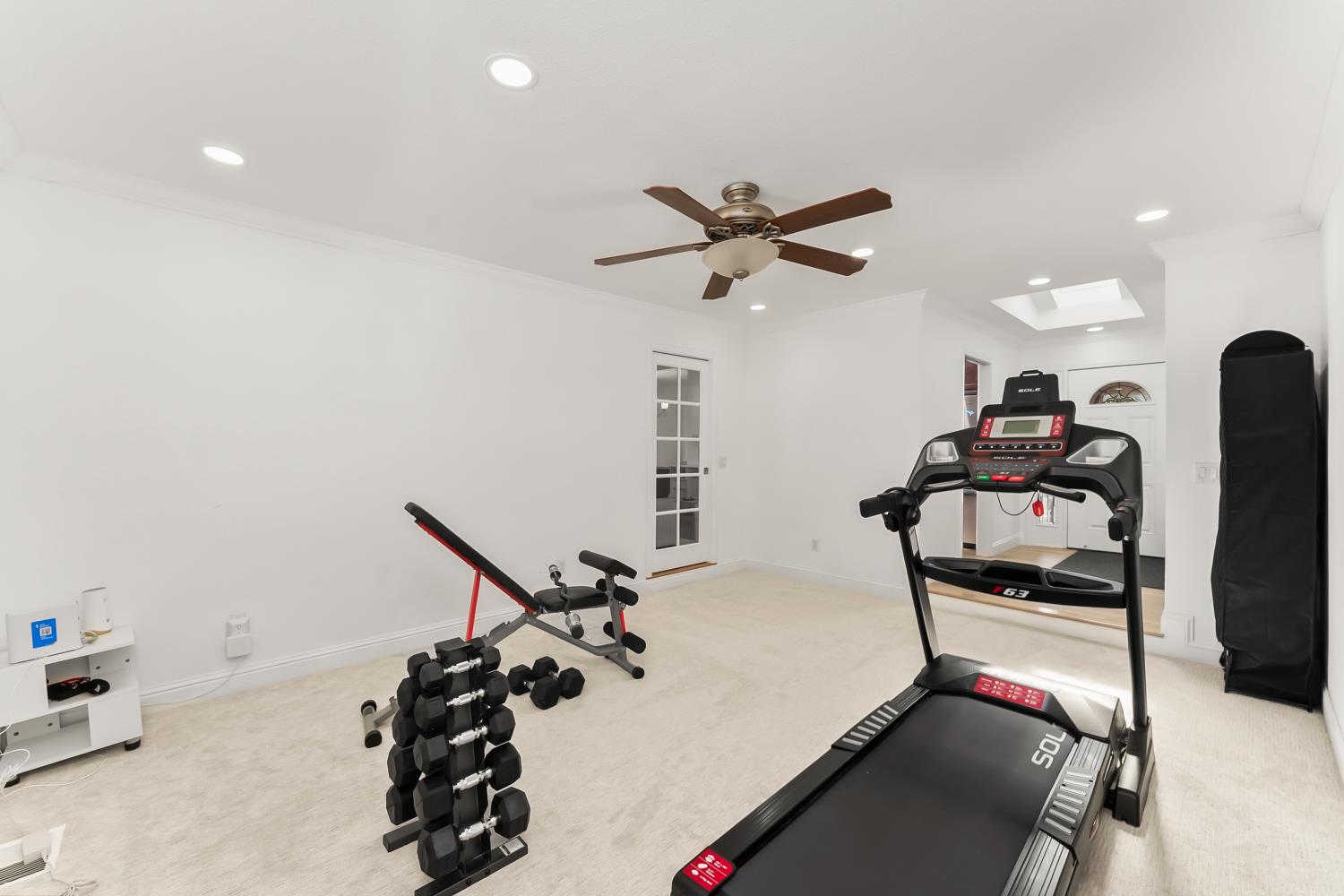 2801 Osborne Road Cameron Park, CA 95682 - Photo 22 of 37 a view of a room with gym equipment