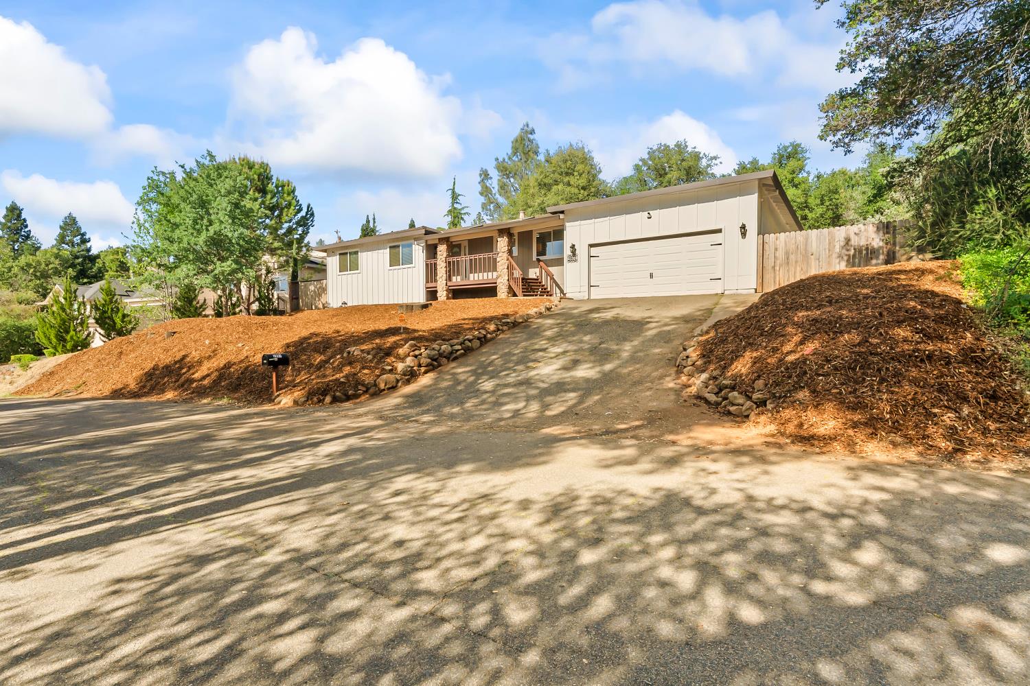 2801 Osborne Road Cameron Park, CA 95682 - Photo 36 of 37 a view of a dry yard with a house