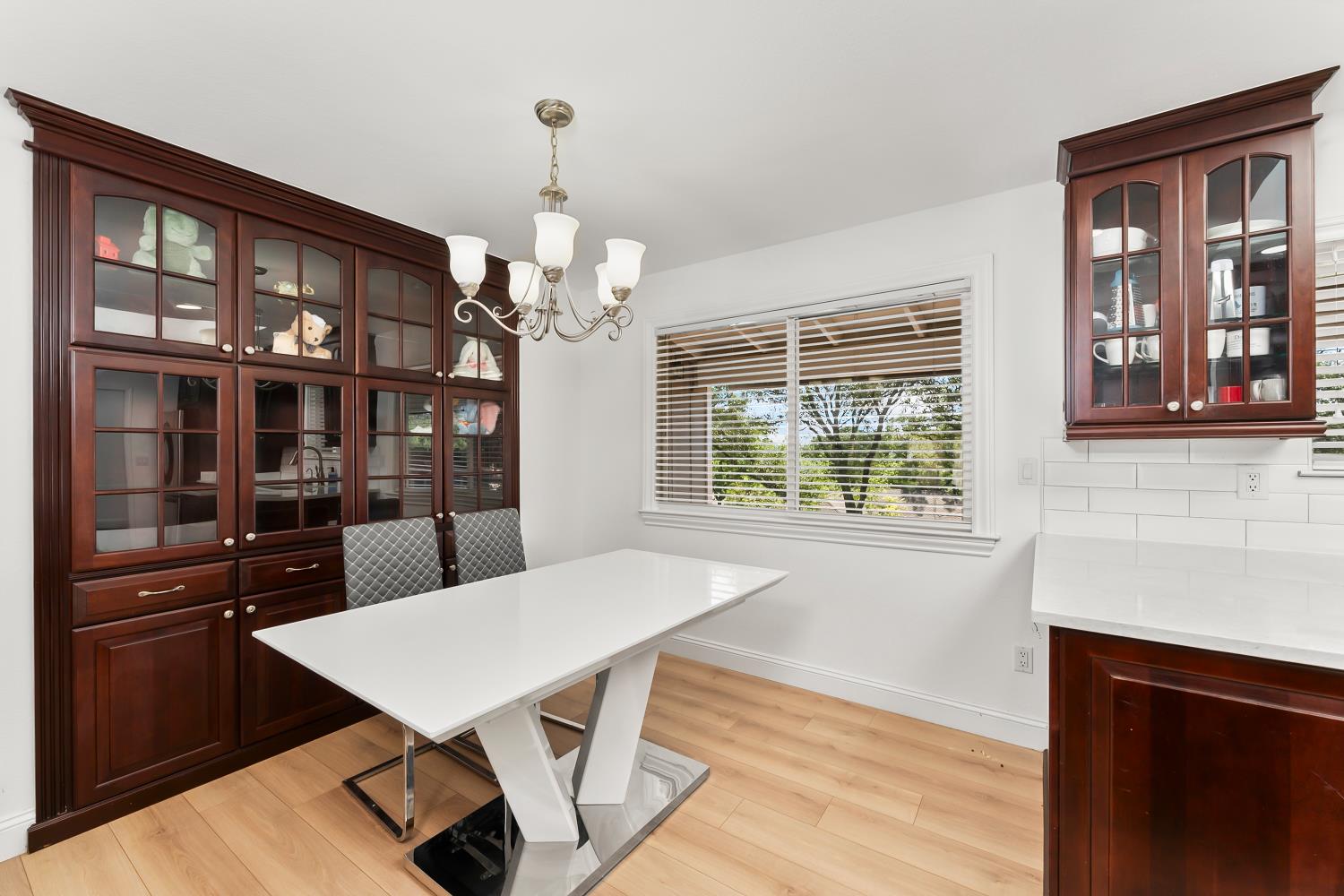 2801 Osborne Road Cameron Park, CA 95682 - Photo 4 of 37 a view of a dining room with furniture window and wooden floor