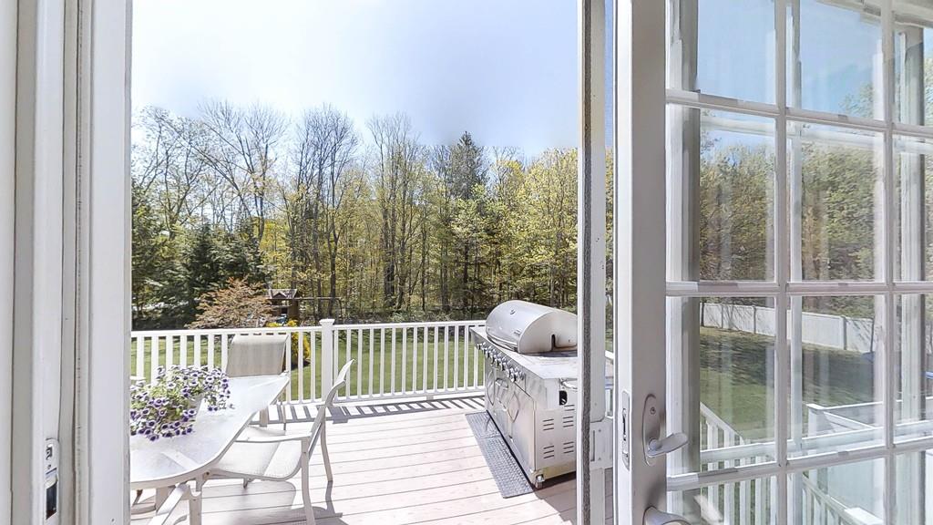 1079 North Brookfield Road Oakham, MA 01068 - Photo 13 of 40 a view of a balcony with wooden floor