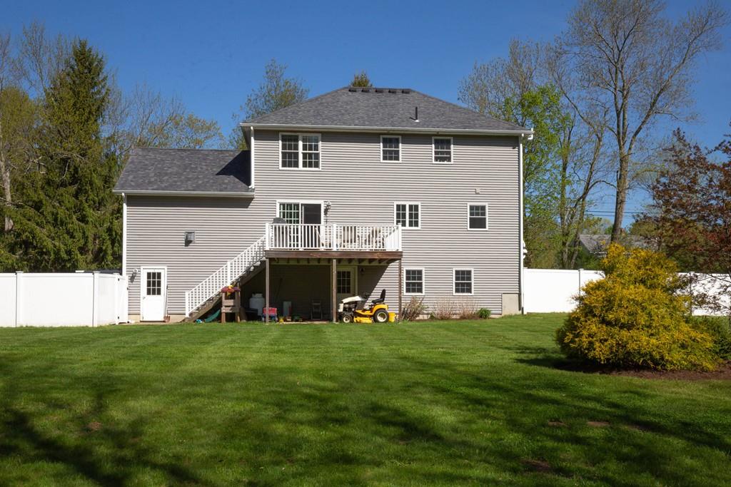 1079 North Brookfield Road Oakham, MA 01068 - Photo 36 of 40 a front view of a house with a garden and trees