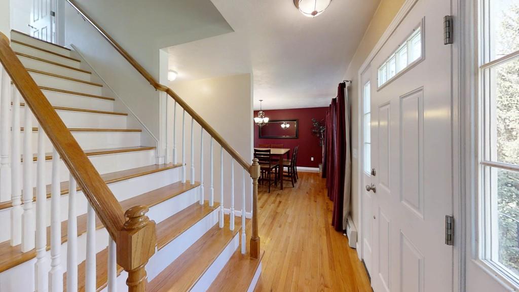 1079 North Brookfield Road Oakham, MA 01068 - Photo 4 of 40 a view of entryway and hall with wooden floor