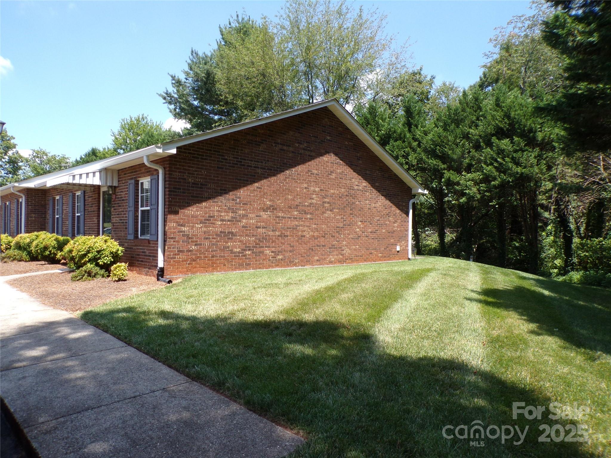 319 7th St Place Southwest, Unit E5 Conover, NC 28613 - Photo 2 of 15 a view of backyard of house with green space