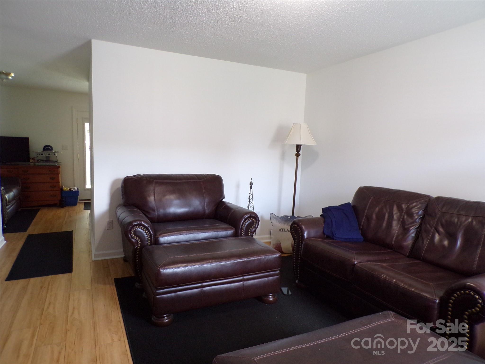 319 7th St Place Southwest, Unit E5 Conover, NC 28613 - Photo 7 of 15 a living room with furniture and a couch