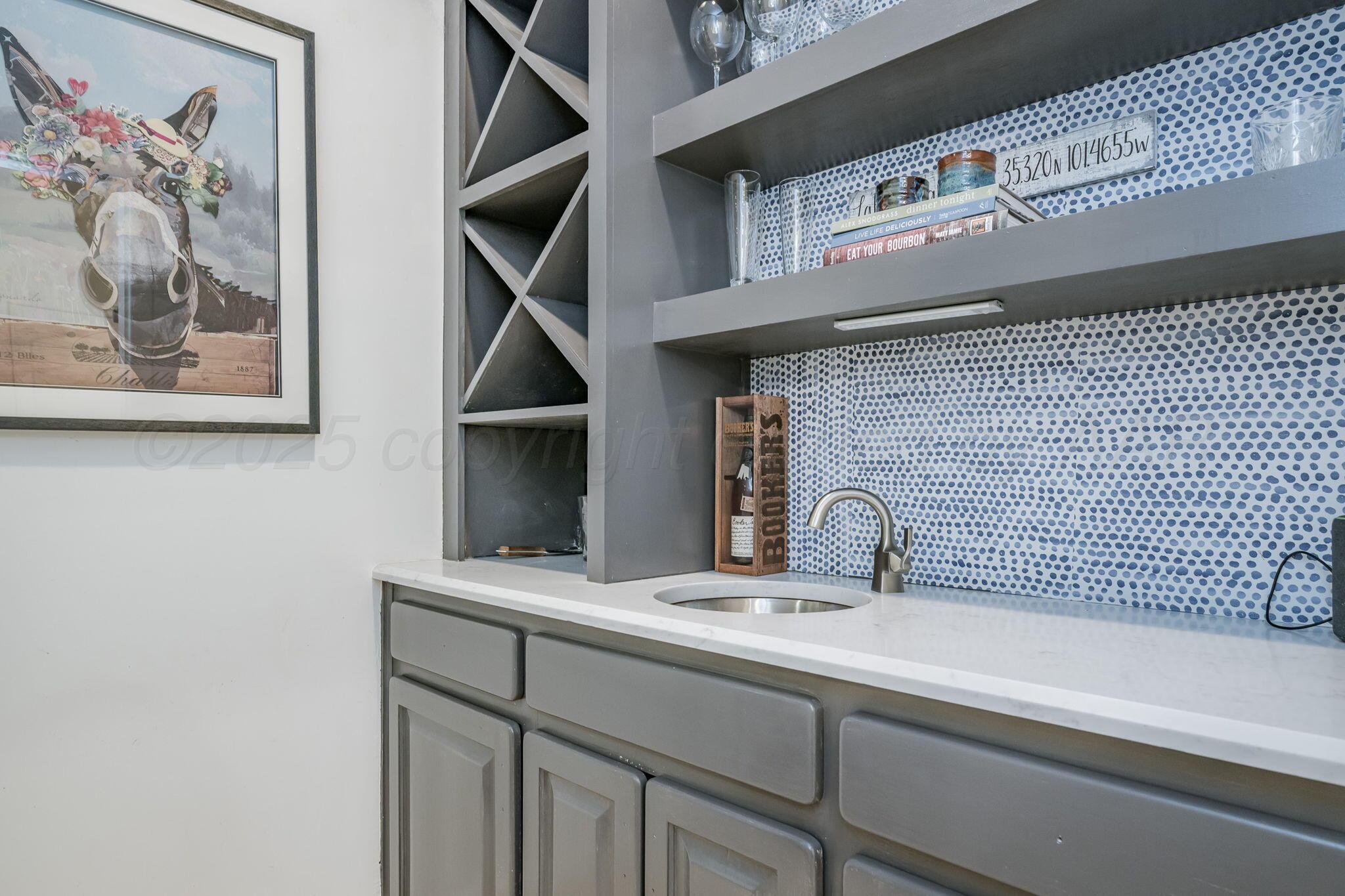 170 Dolphin Terrace Amarillo, TX 79118 - Photo 20 of 56 a bathroom with a sink and a mirror