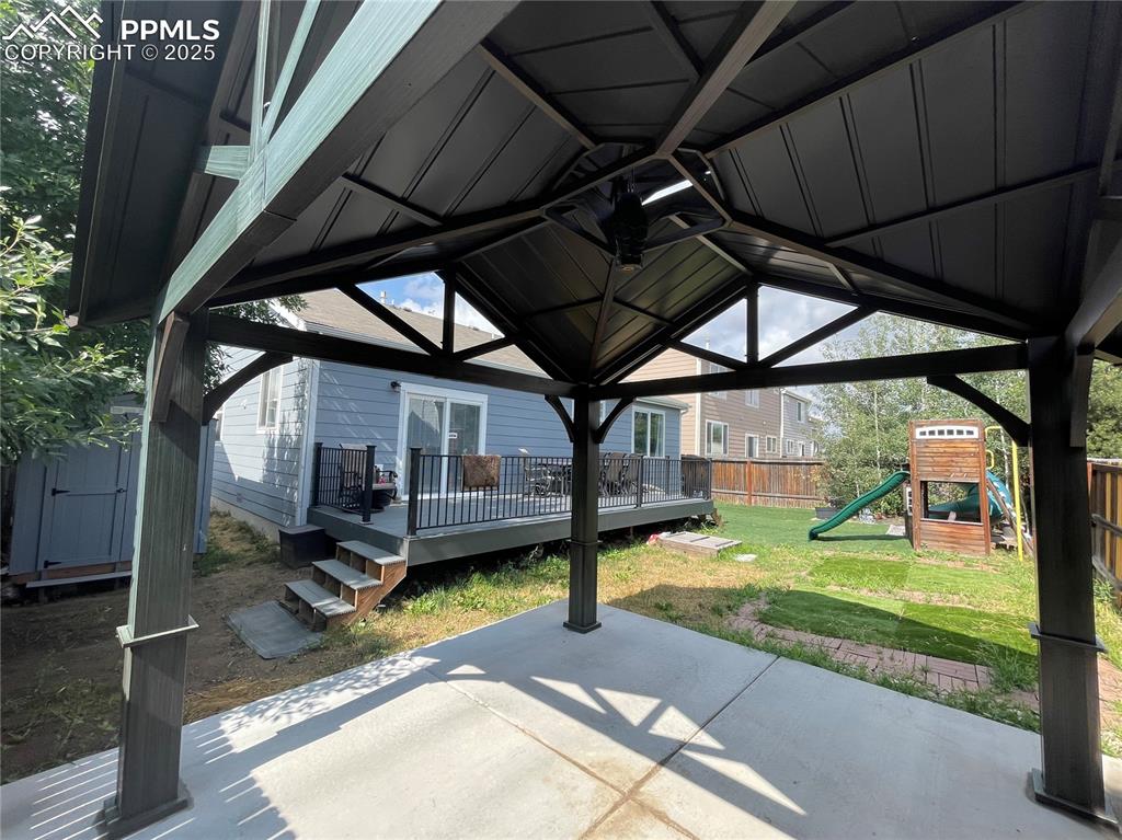 7631 Coffee Road Peyton, CO 80831 - Photo 27 of 28 a view of a backyard of a house
