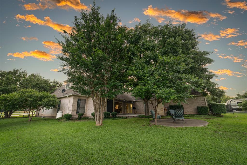 1425 Pecan Hill Road Stephenville, TX 76401 - Photo 31 of 40 a couple of table and chairs in the garden