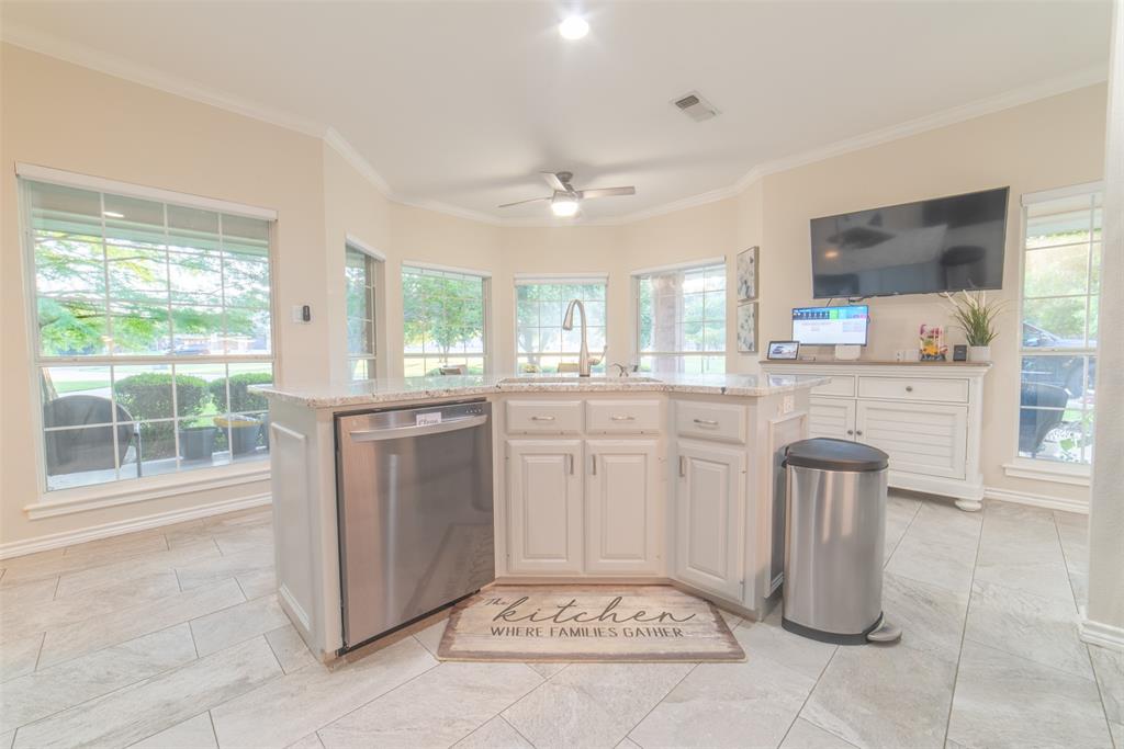 1425 Pecan Hill Road Stephenville, TX 76401 - Photo 35 of 40 a kitchen with a sink cabinets and window