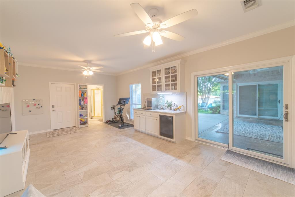 1425 Pecan Hill Road Stephenville, TX 76401 - Photo 39 of 40 a view of a kitchen with a sink and a large window