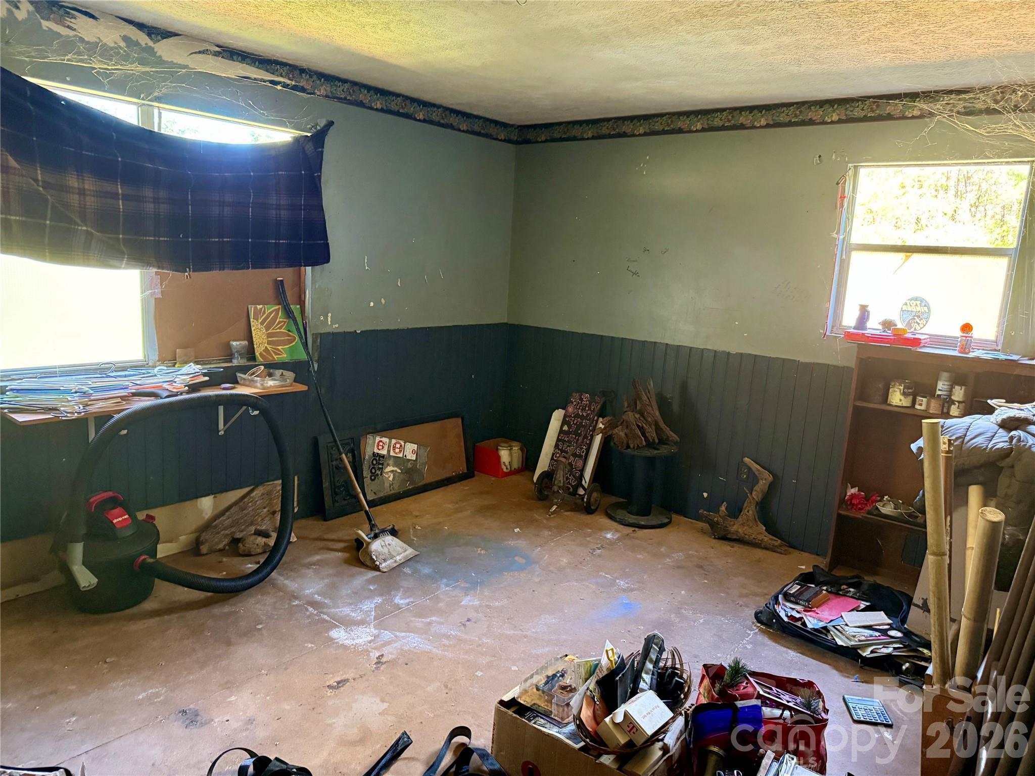 229 Kelsey Lane Rutherfordton, NC 28139 - Photo 20 of 25 a room with furniture a flat screen tv and a window