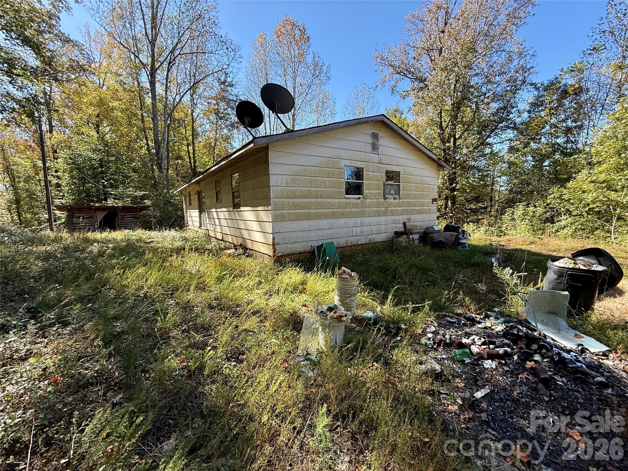 229 Kelsey Lane Rutherfordton, NC 28139 - Photo 2 of 25 a backyard of a house with lots of green space