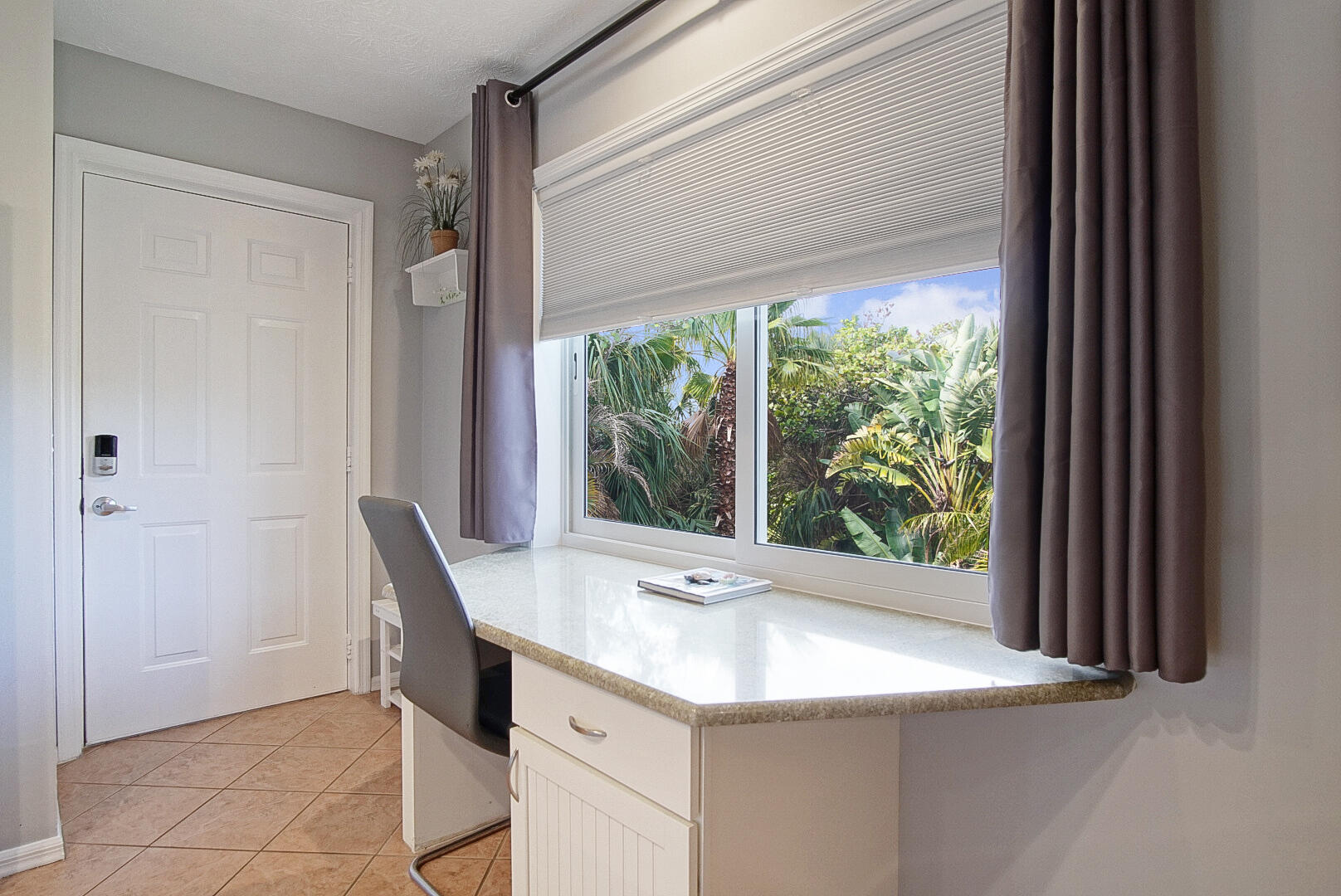 413 Hernando Street Fort Pierce, FL 34949 - Photo 15 of 43 a room with a window and a sink