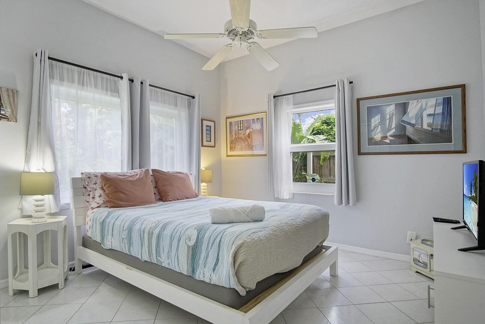 413 Hernando Street Fort Pierce, FL 34949 - Photo 29 of 43 a bedroom with a large bed and a window