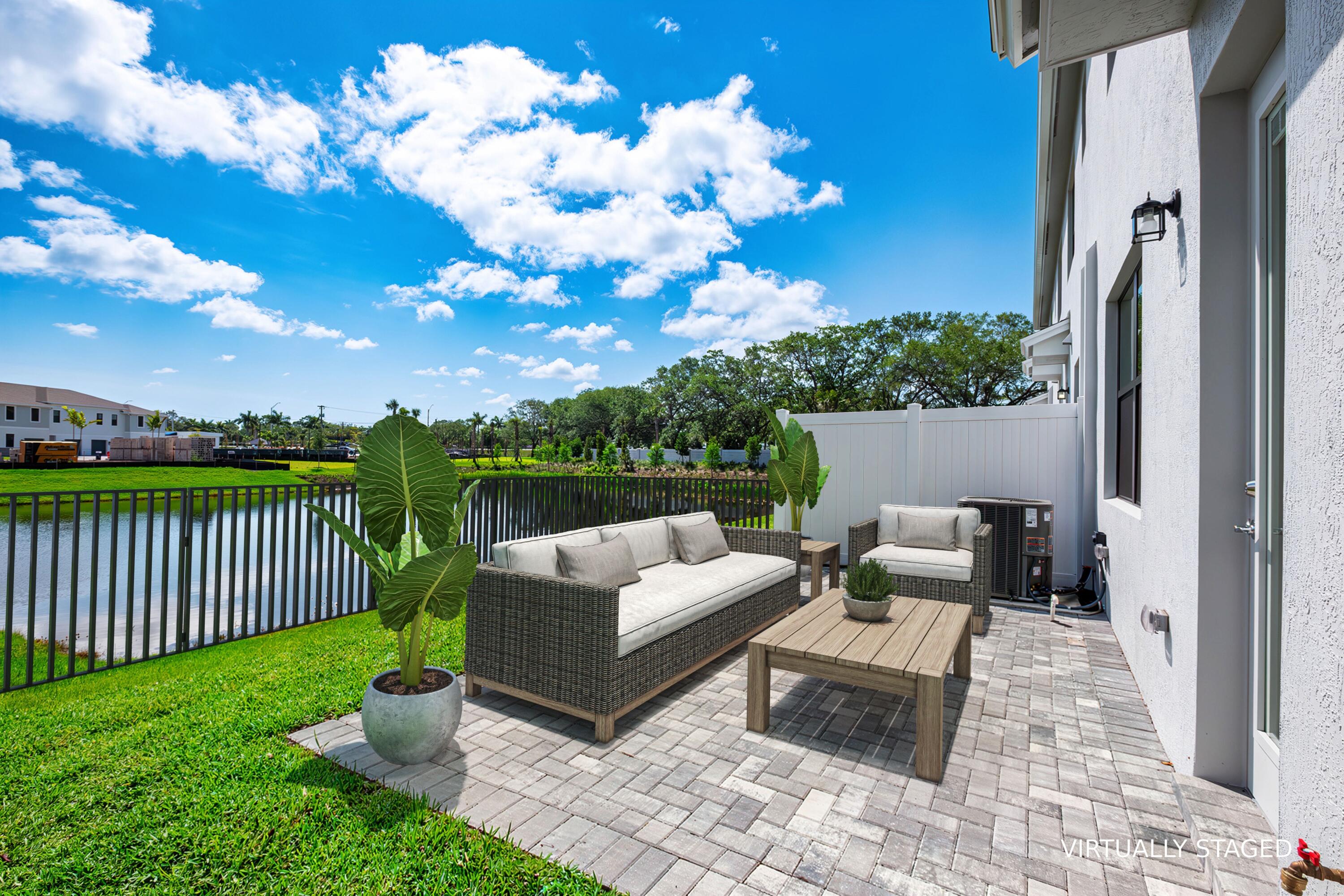 7645 Southwest Lucy Lane Stuart, FL 34997 - Photo 12 of 24 7645 SW Lucy Staged Backyard