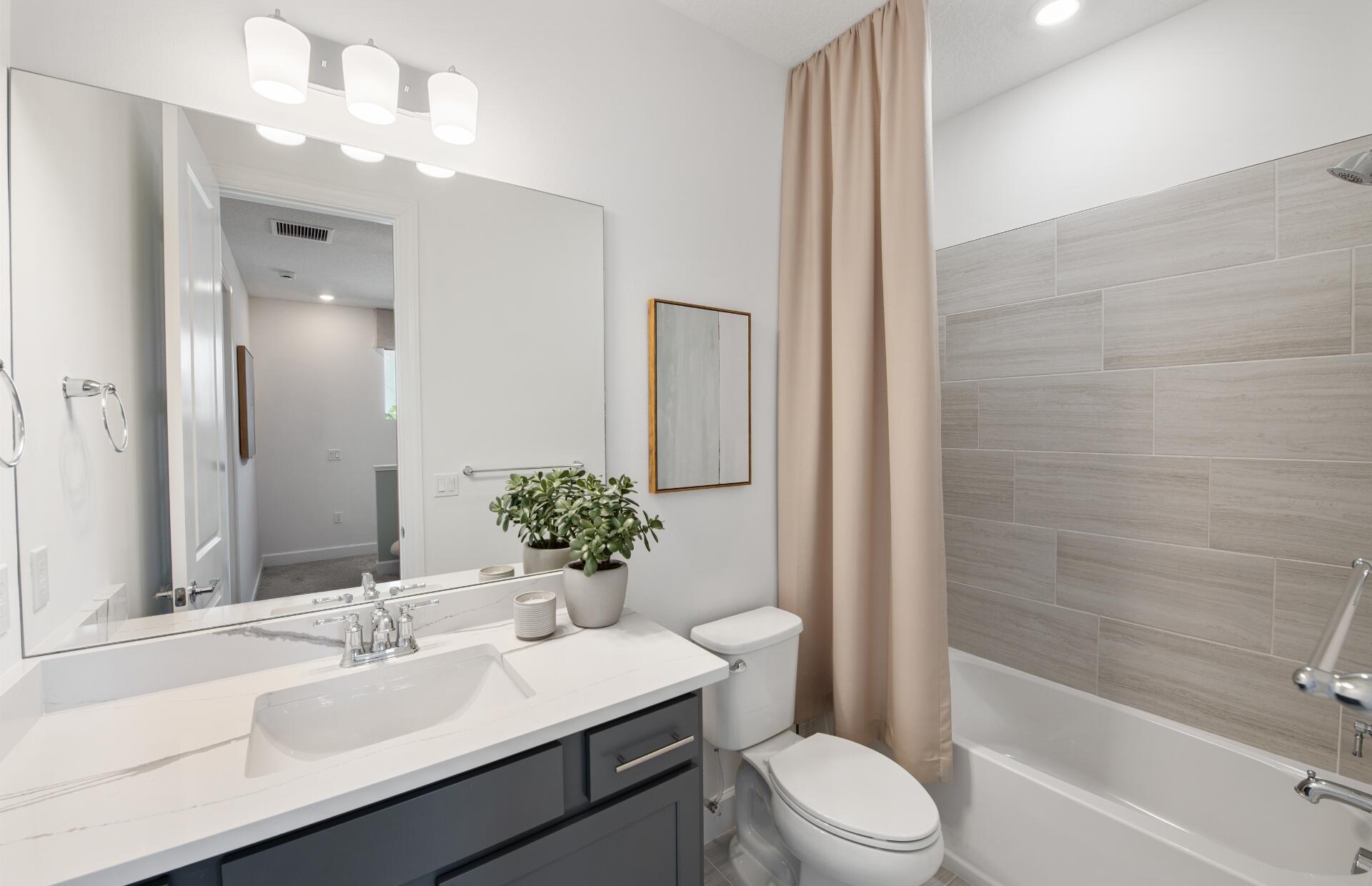 7645 Southwest Lucy Lane Stuart, FL 34997 - Photo 8 of 24 SEFL_PU_CAM_Nautical Bath 2