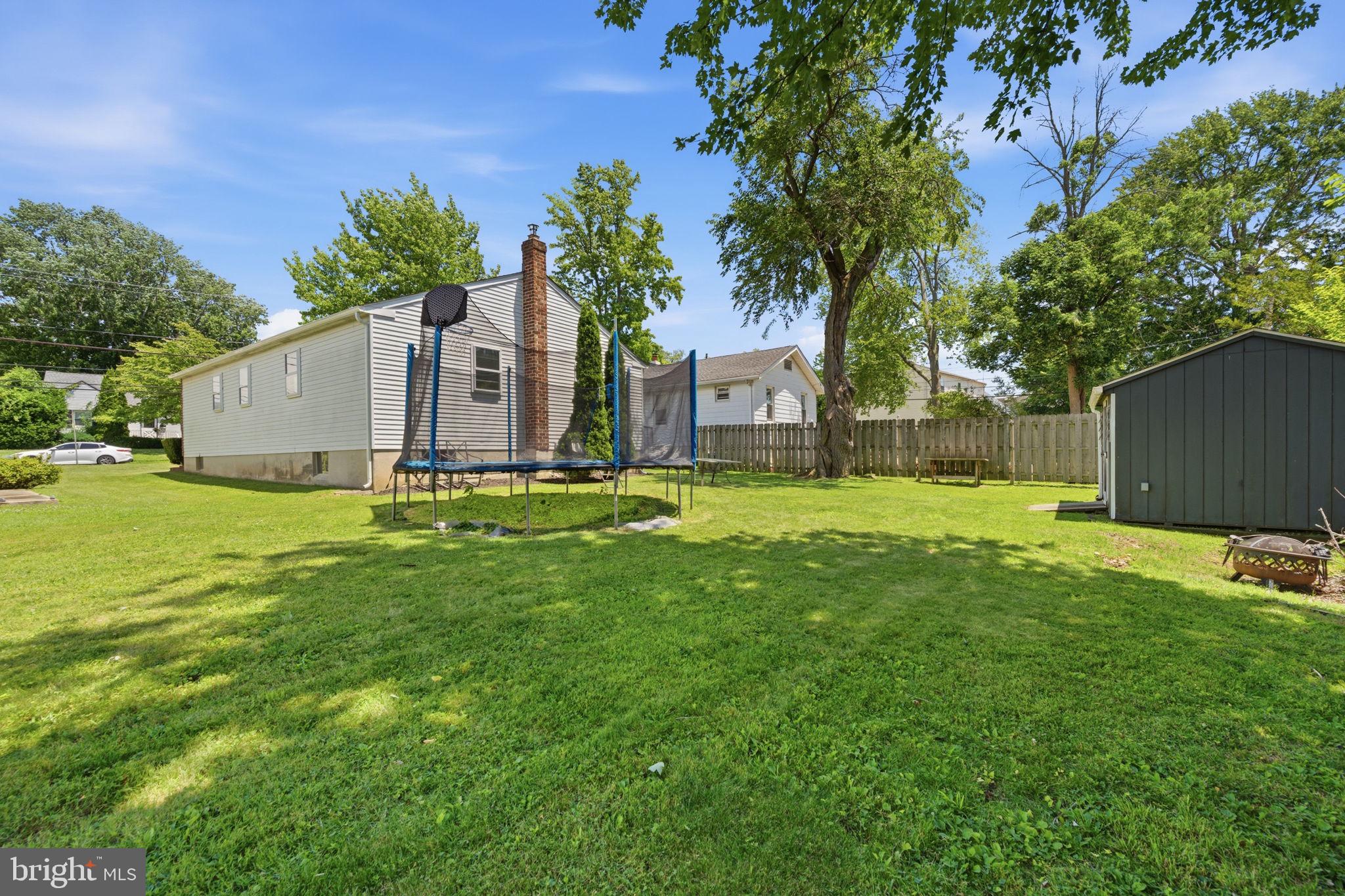905 Amosland Road Morton, PA 19070 - Photo 42 of 44 Spacious yard with playful charm.