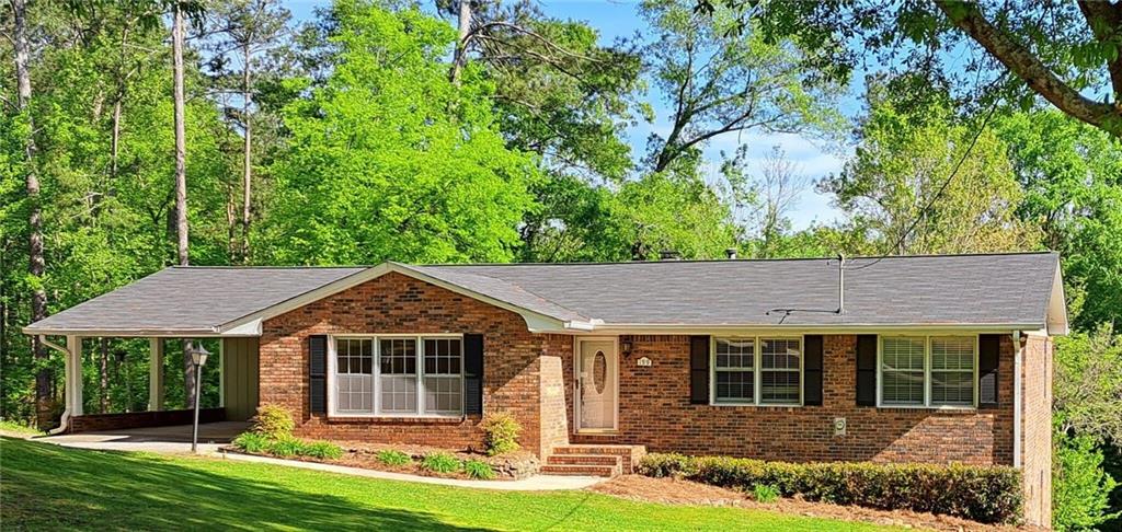 front view of a house with a yard