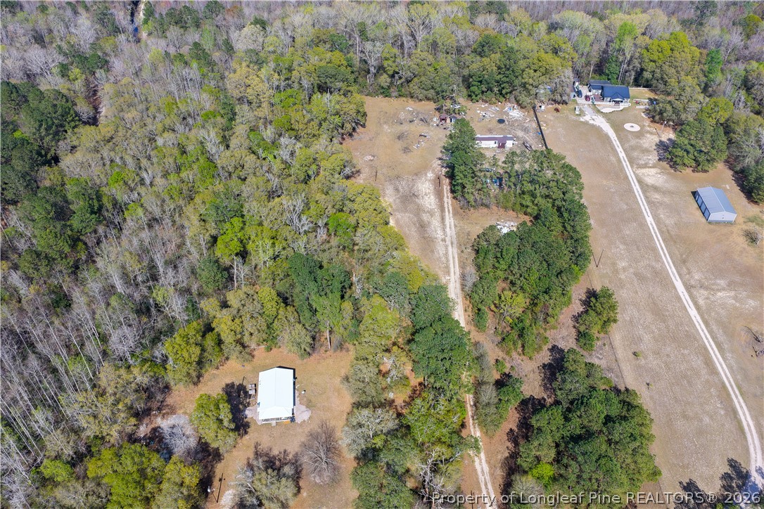 93 Gods Road Orrum, NC 28369 - Photo 2 of 5 an aerial view of residential house with outdoor space