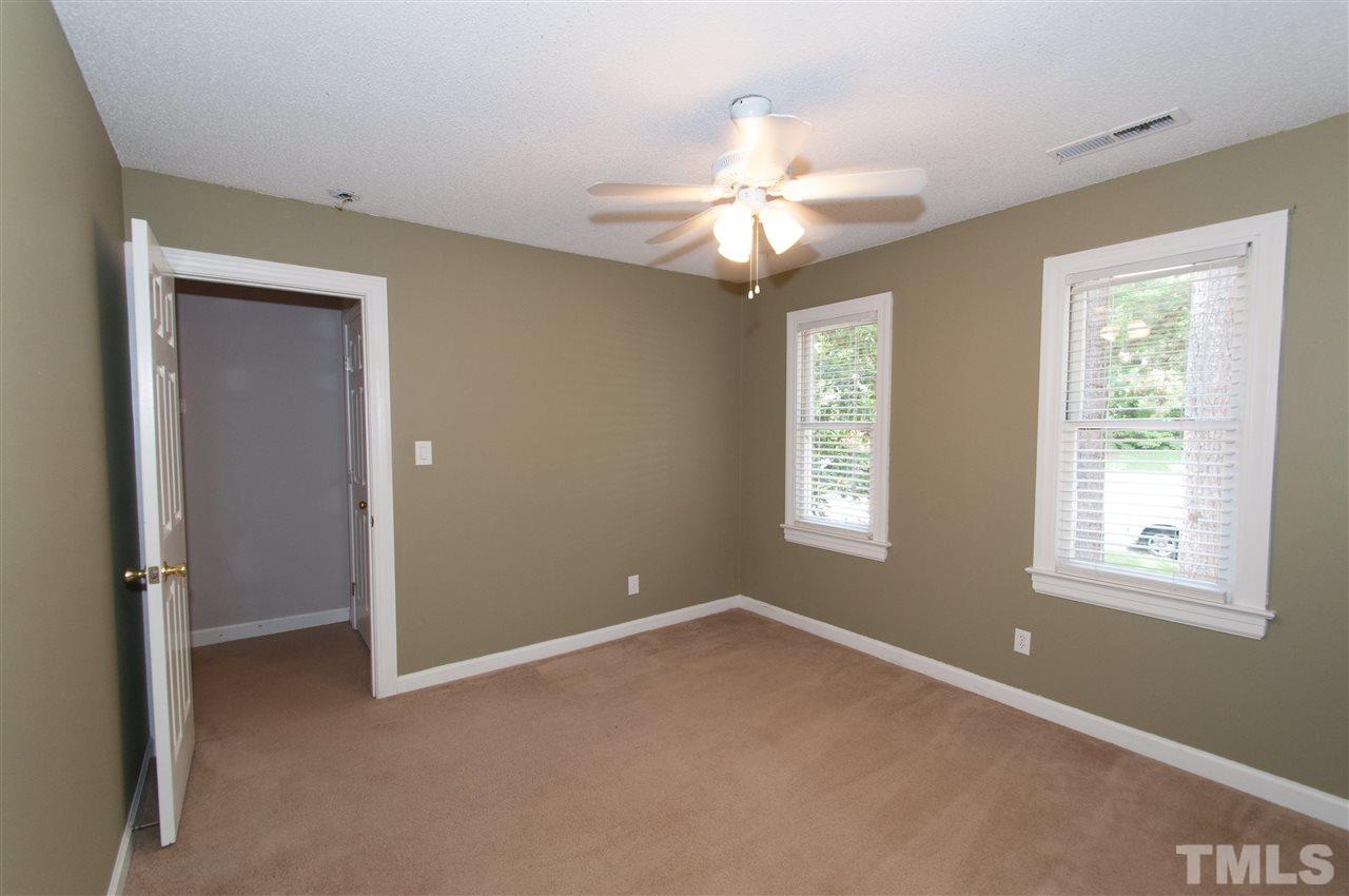 7304 Chicora Court Raleigh, NC 27615 - Photo 13 of 25 a view of an empty room with a window