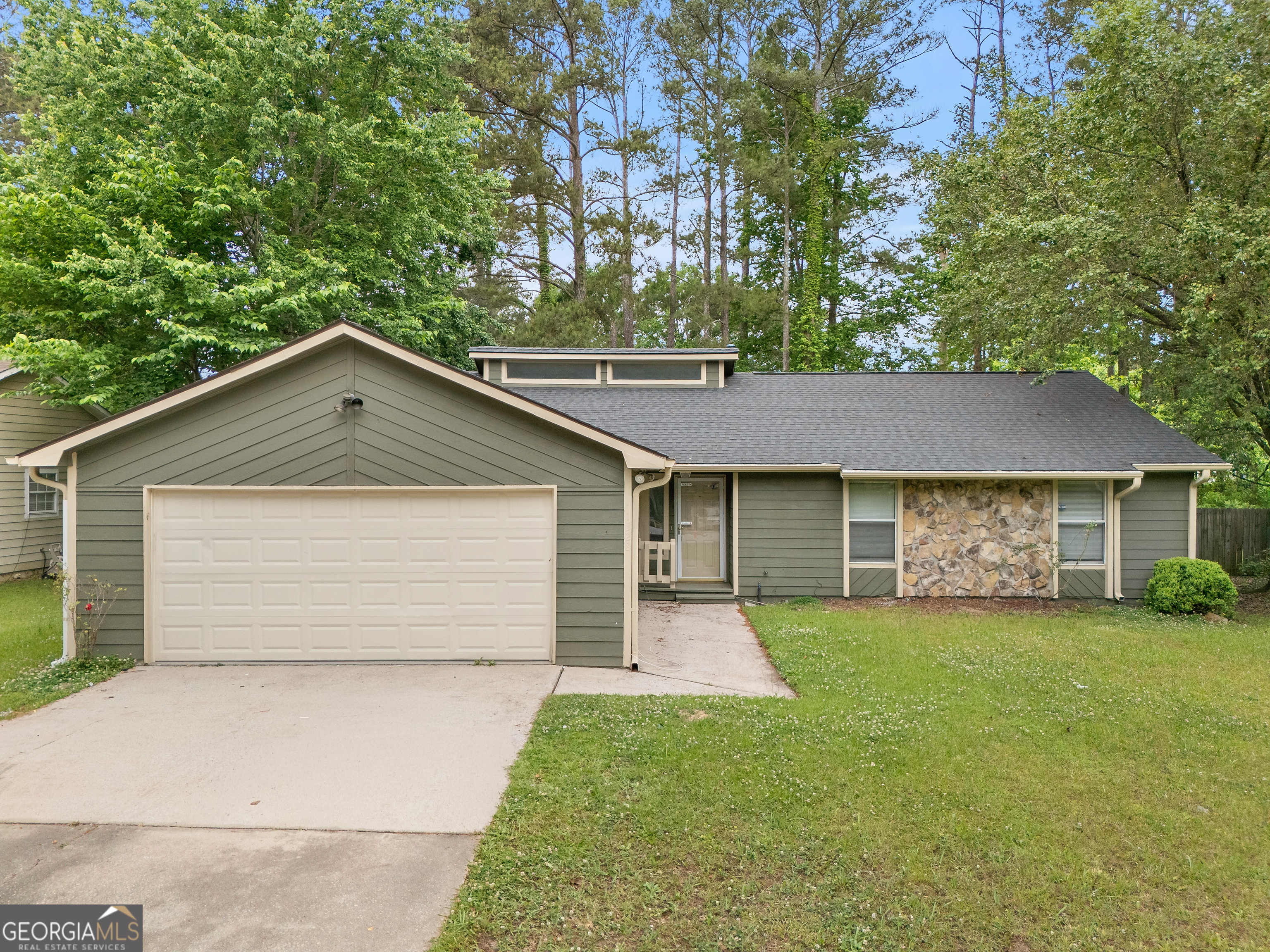 1328 Foxvale Drive Hampton, GA 30228 - Photo 1 of 27 a front view of a house with yard