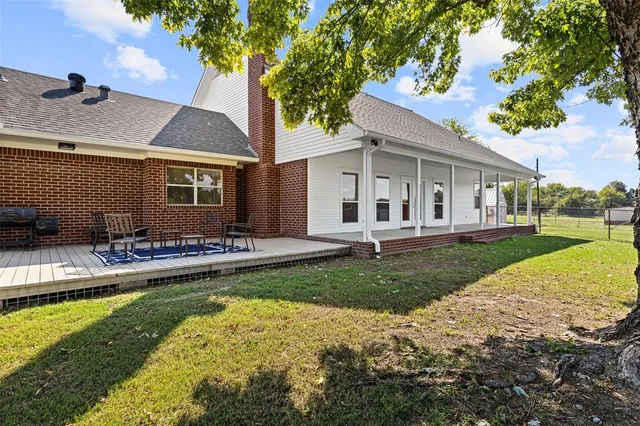 a view of a porch with a backyard