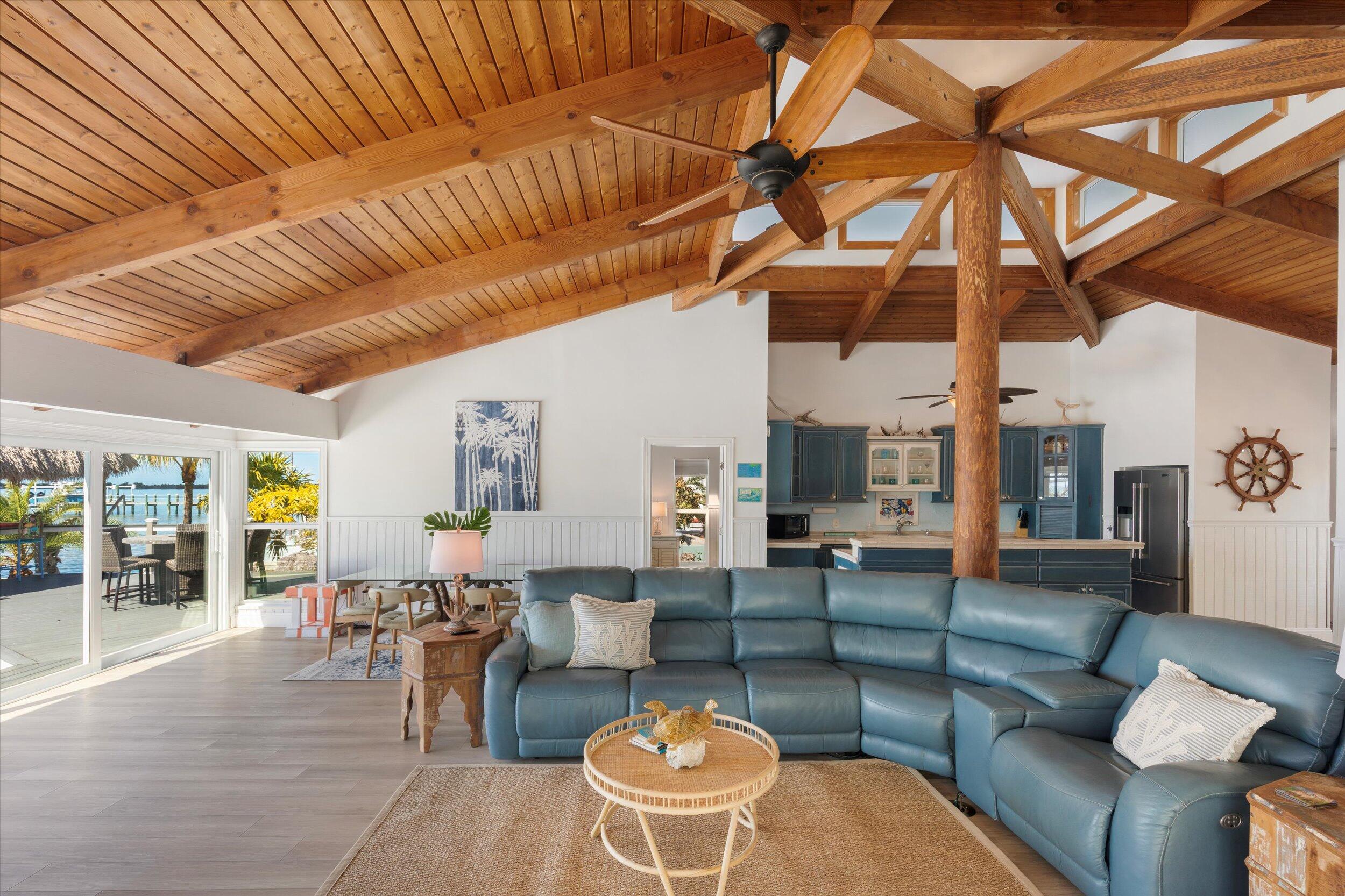 29581 Richard Road Big Pine Key, FL 33043 - Photo 20 of 78 a living room with furniture and wooden floor
