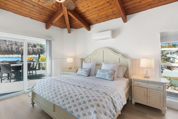 an aerial view of a house with a yard and garden