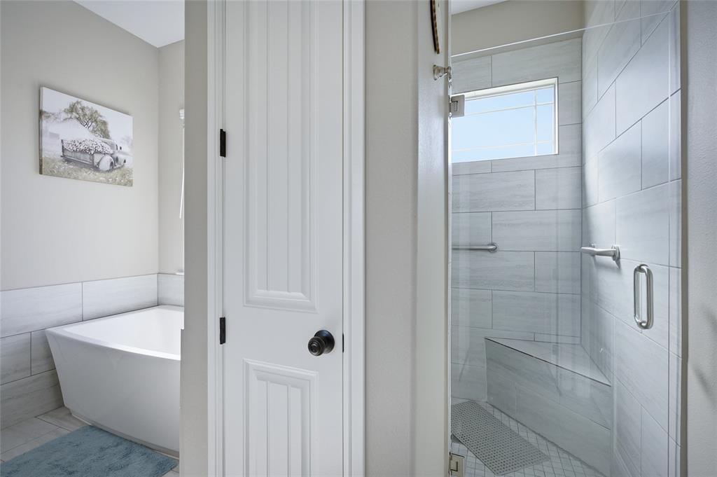 1065 Old Highway Howe, TX 75459 - Photo 24 of 39 Full bath with a shower stall and a soaking tub